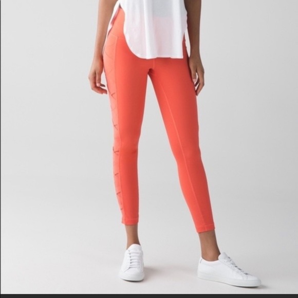 Lululemon Rise and Flow legging in Cape Red coral color with pockets, high rise! - Picture 2 of 9